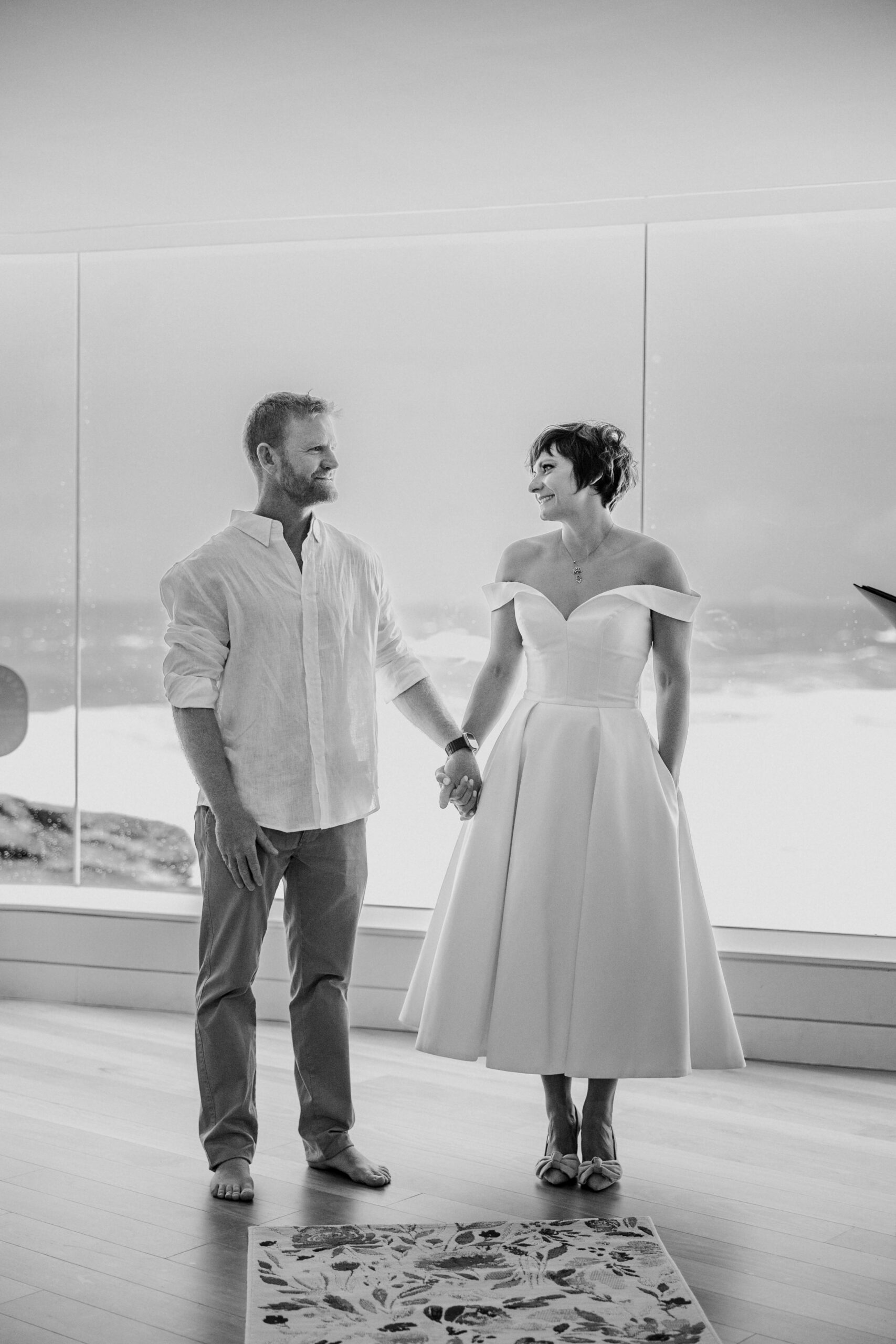 tamarama wedding bondi wedding surf life saving club mature age couple elopement tea length dress british couple