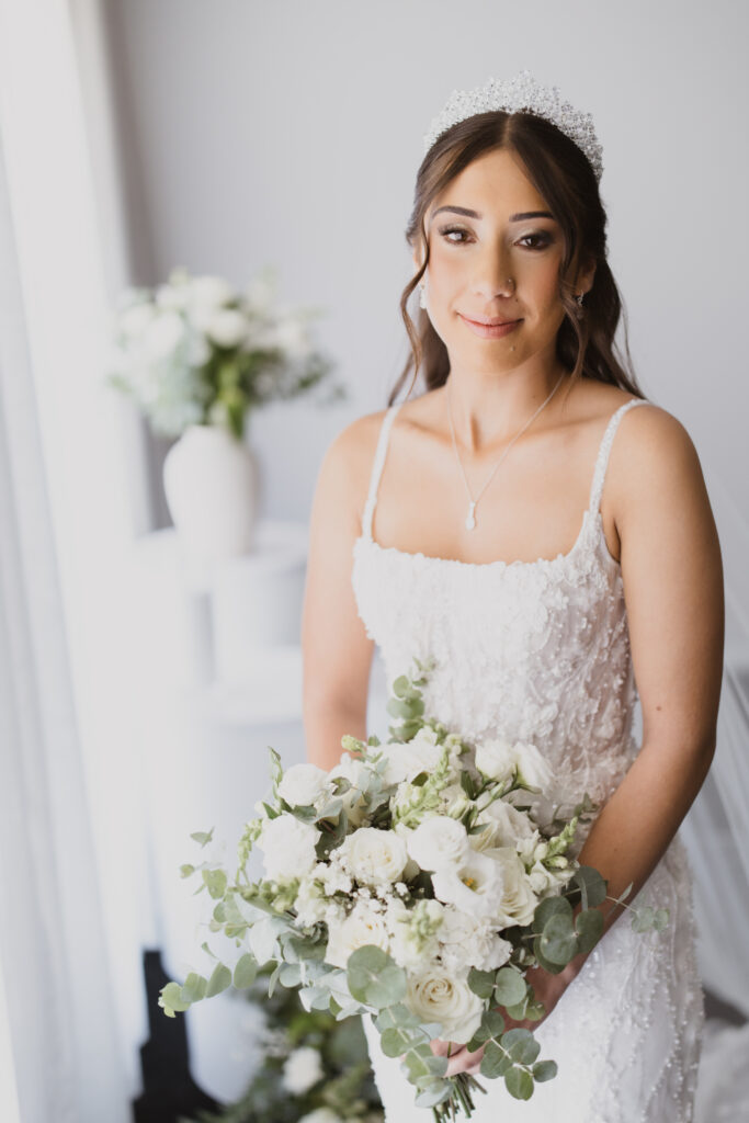 Bride with her bouquet shot by Meredith Photography