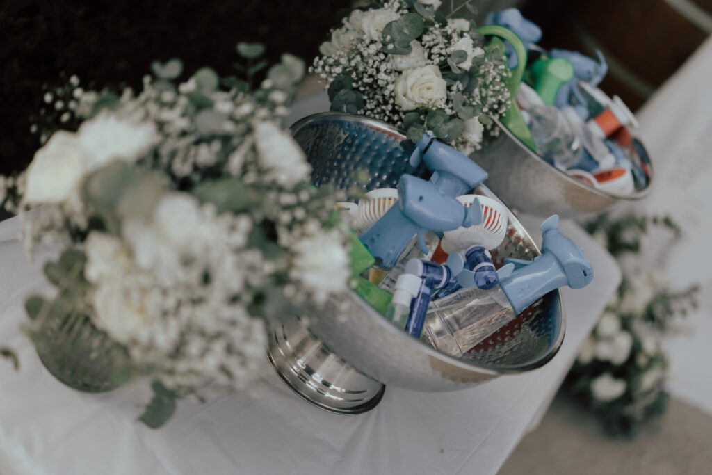 Detail shot of fans for a hot summer wedding at The Hayshed shot by Meredith Photography